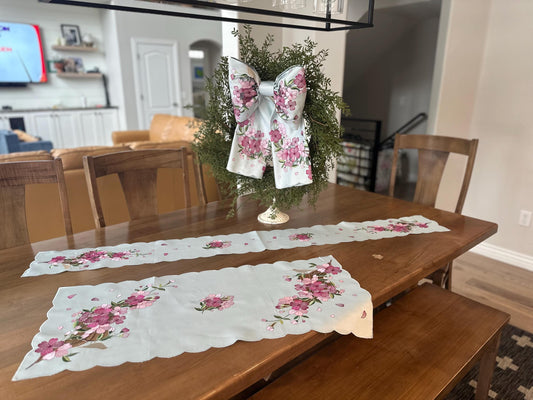 table runners and bow with elegant cherry blossom embroidery on soft blue washable fabric