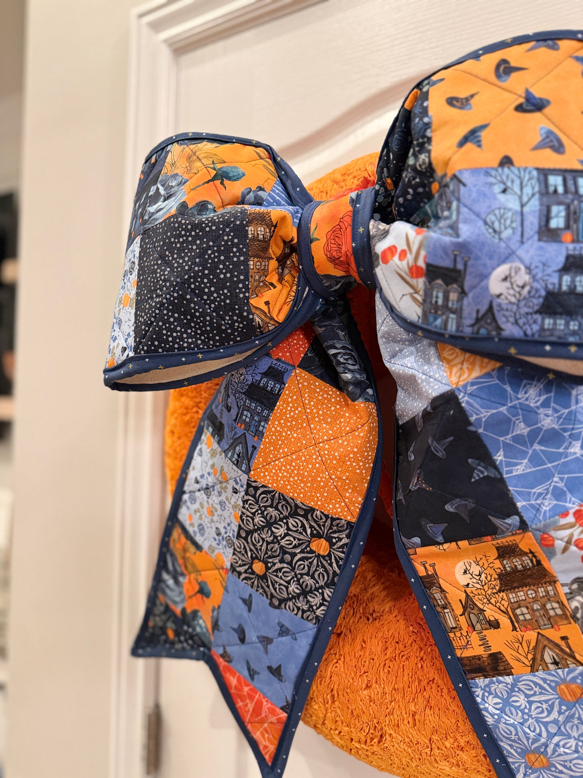 Moody Blue and Orange Halloween Quilted Bow