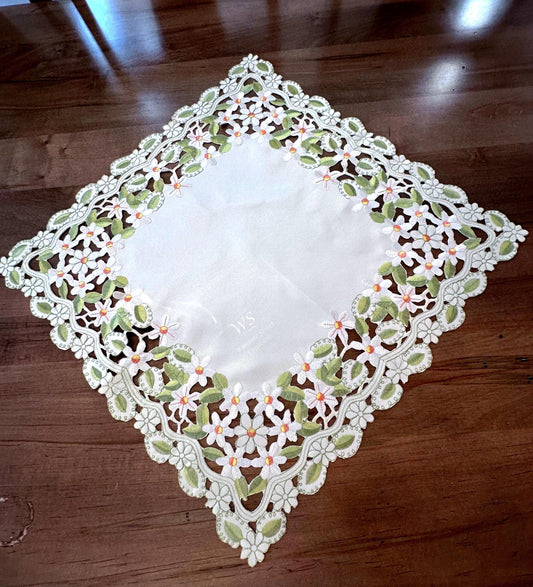 daisy collection of embroidered cutwork.  the perfect  table toppers 36”. square is the perfect addition to your everyday linens