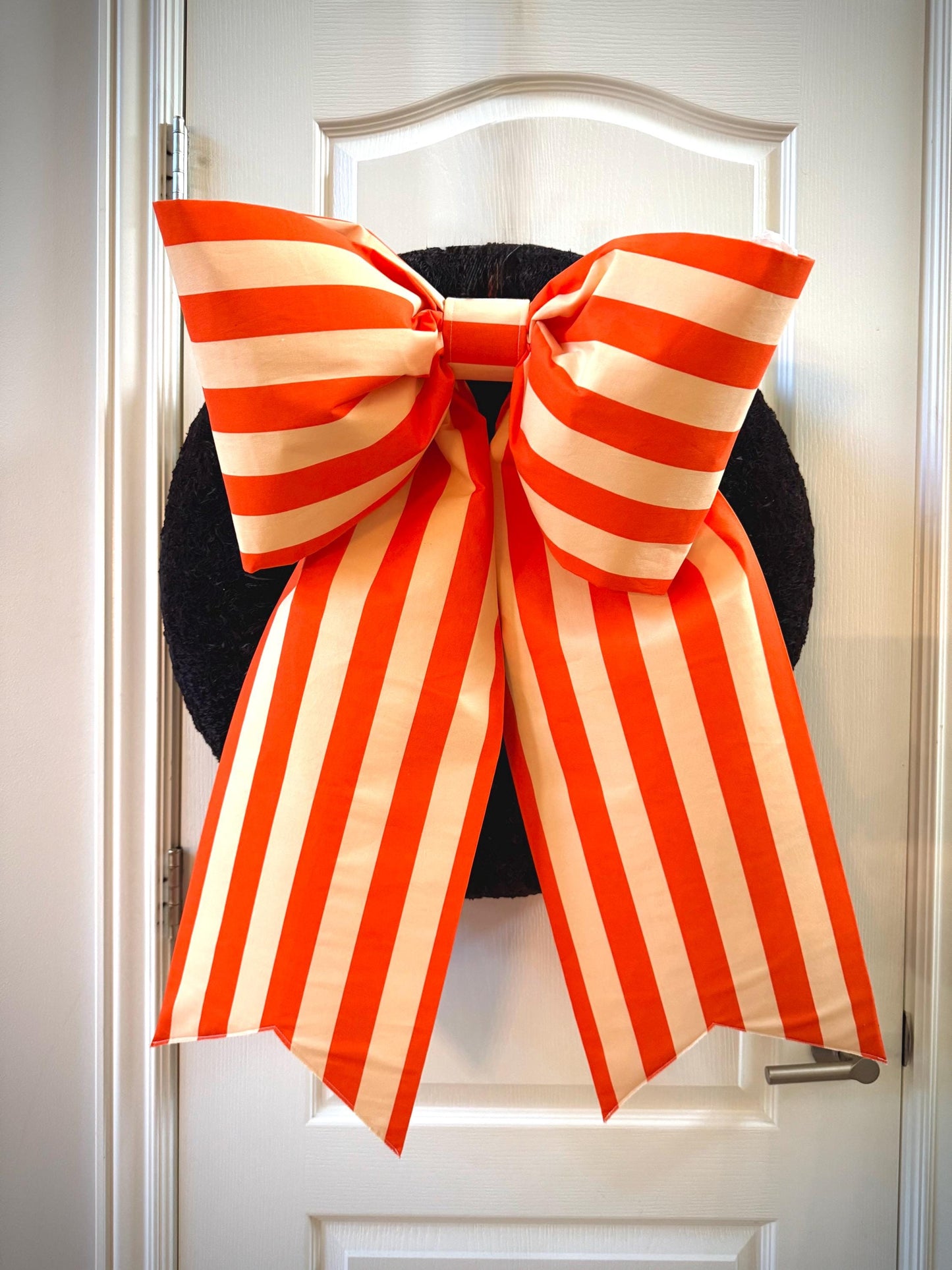 Orange stripe bow for fall and Halloween decor.   hang on wreaths or by its self.